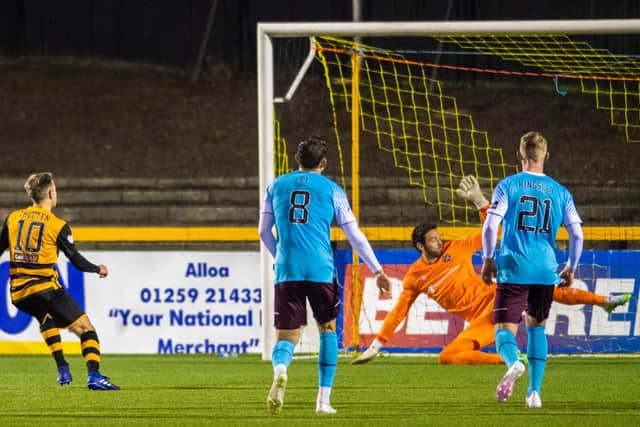 Alloa's Alan Trouten makes it 1-0 from the penalty spot during the Betfred Cup match against Hearts.