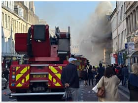 Firefighters are battling a huge blaze on South Bridge in Edinburgh city centre on Saturday evening. Photo: Annabelle Gauntlett.