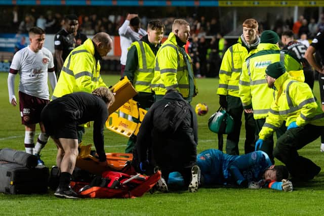 Cammy Devlin was in close attendance before Craig Gordon was stretchered off at Tannadice. Picture: by Mark Scates / SNS