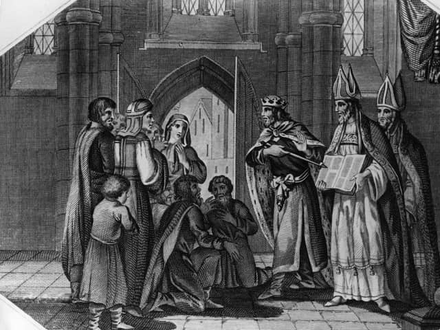 The current royal family can trace their ancestors back to the Anglo-Saxon King Athelstan, depicted ordering the Bible to be translated into old English (Picture: Hulton Archive/Getty Images)