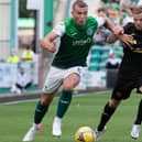 Former Hibs defender Ryan Porteous in action against Bruce Anderson during a match at Easter Road in 2021. Picture: SNS