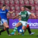 Rosie Livingstone of Hibs skips away from the challenge of Rangers' Chelsea Cornet during the Sky Sports Cup final. Picture: Malcolm Mackenzie