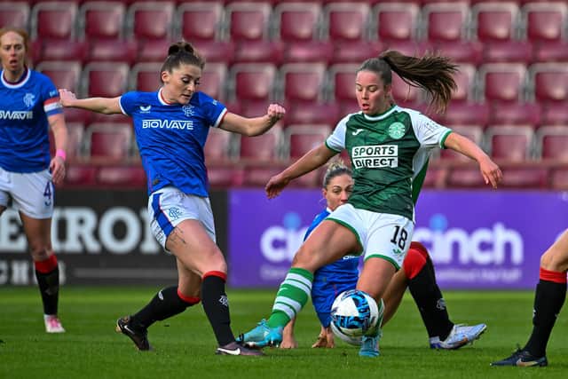 Rosie Livingstone of Hibs skips away from the challenge of Rangers' Chelsea Cornet during the Sky Sports Cup final. Picture: Malcolm Mackenzie