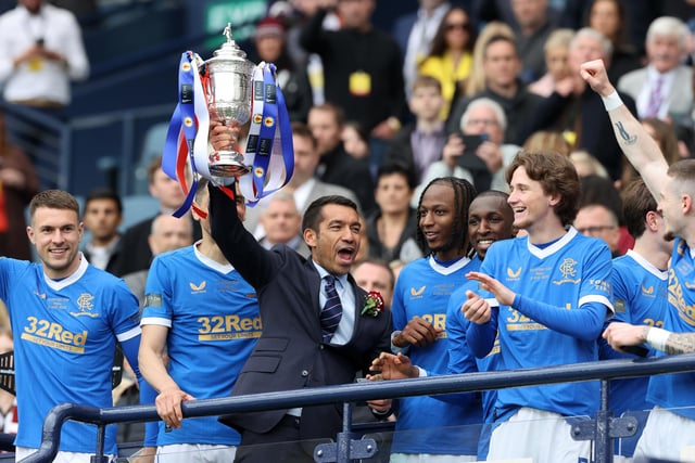 Rangers manager Giovanni van Bronckhorst lifts the Scottish Cup after the final whistle of the Scottish Cup final at Hampden Park, Glasgow. Picture date: Saturday May 21, 2022.
