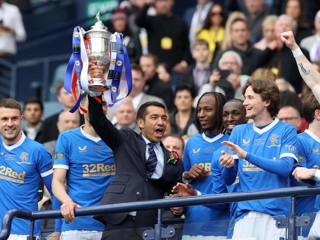 Rangers manager Giovanni van Bronckhorst lifts the Scottish Cup after the final whistle of the Scottish Cup final at Hampden Park, Glasgow. Picture date: Saturday May 21, 2022.