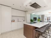 The fabulous open plan kitchen/dining/family room with bi-folding doors.
