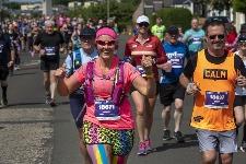 In the pink: thumbs up from runners on Sunday morning