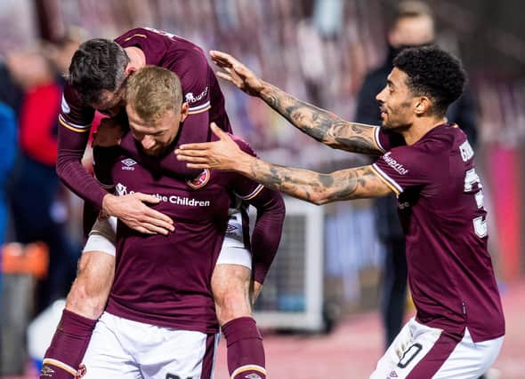 Hearts players Stephen Kingsley, Michael Smith and Josh Ginnelly all stood out against Dundee on Friday.