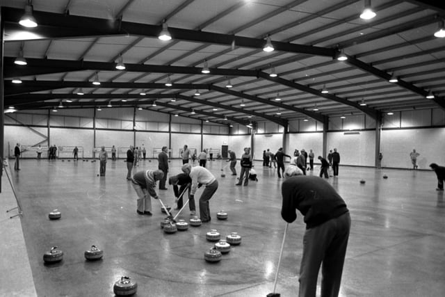 Curlers check out the new seven lane curling rink at Murrayfield in Edinburgh. Year: 1980