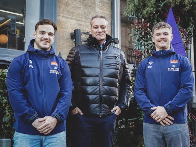 Nic Wood, director of Signature Pubs, with Edinburgh Rugby players Wes Goosen and Darcy Graham.