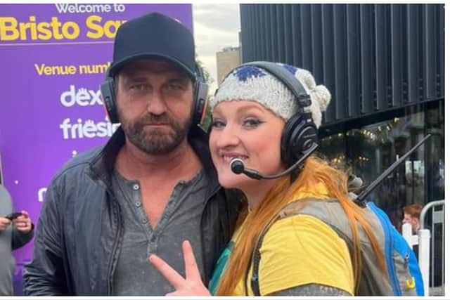 Gerard Butler was pictured with a member of the Silent Adventures team, who run the silent disco at Bristo Square in Edinburgh. Photo: Silent Adventures