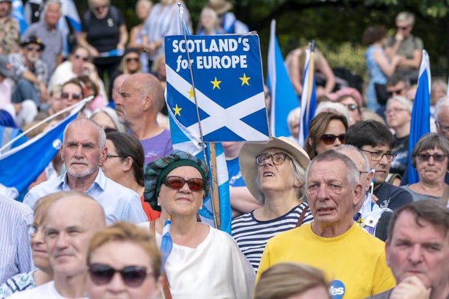 An anti-Brexit banner, saying Scotland still wants to be part of Europe, was held aloft. Photo credit: Jane Barlow/PA Wire