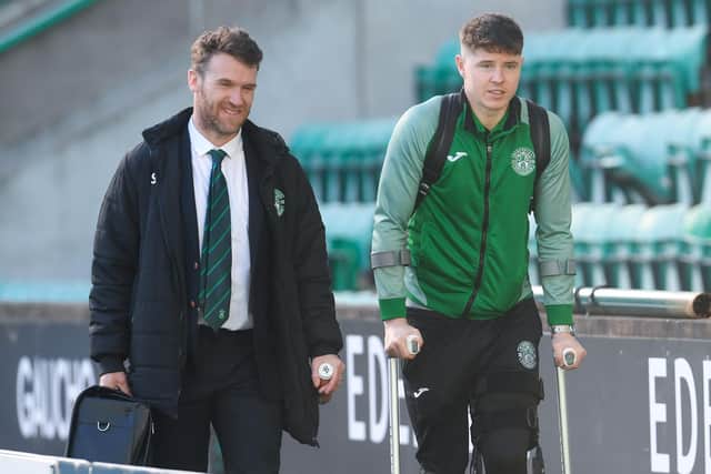 Kevin Nisbet leaves Easter Road on crutches after the Celtic game
