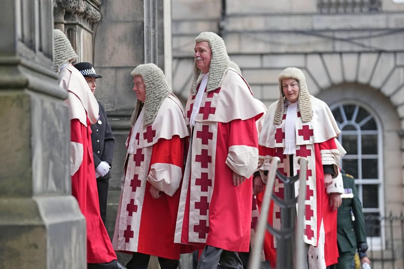 Judges were also among those who arrived at St Giles' ahead of the service.