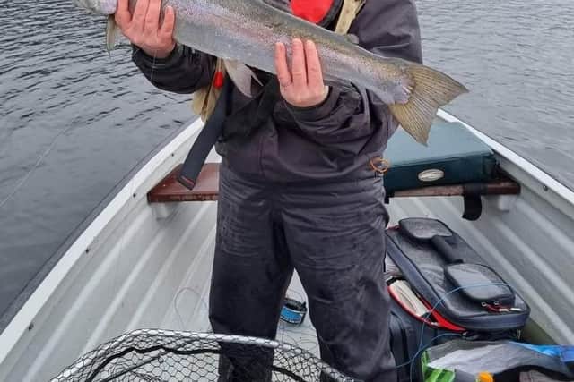 Sam Hayhurst, an Edinburgh-based nurse, with a superb rainbow trout at Lake of Menteith Fisheries on opening day. Picture by Paul Barr and contributed by Lake of Menteith Fisheries