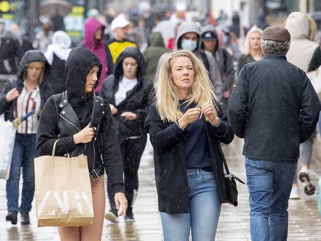 Shoppers on Edinburgh's Princes Street (Picture: Lesley Martin/AFP via Getty Images)