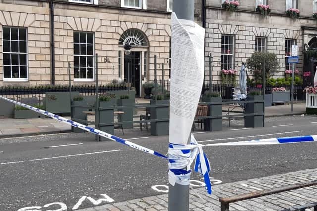 The police cordoned off this part of George Street this morning following last night's incident. Photo by Ian Swanson