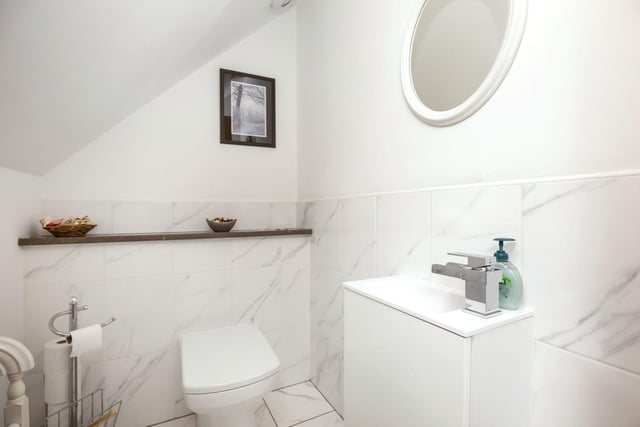 Another of the property's two en-suite bathrooms, serving one of the four double bedrooms.