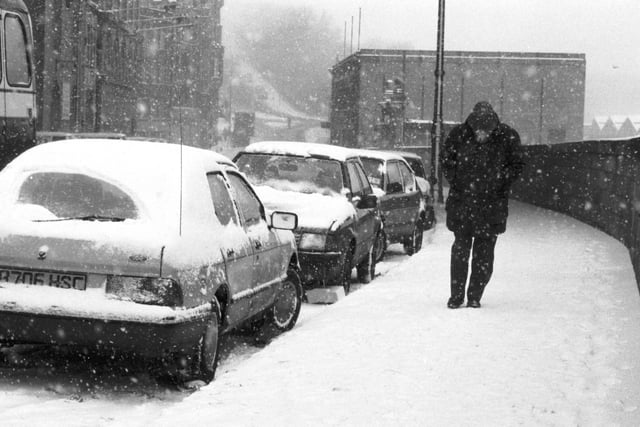 A man struggles against the snow in Market Street in January 1987.