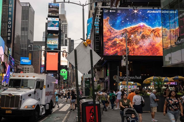 The images were also displayed on screens at Times Square in New York.