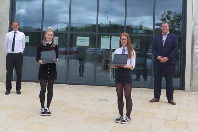 From left to right in the picture are: Newbattle Depute Head Mark Davidson, School Captain Beth Aitken, School Depute Captain Iona Westaby and Education’s Digital Support Lead Colin McCabe, who is organising the roll-out of the Equipped for Learning project.