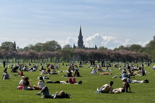 Hundreds of people flocked to The Meadows to sunbathe with friends after temperatures reached 17 degrees.