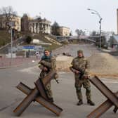 Ukrainian soldiers guard a checkpoint at Independence Square in Ukraine's capital Kyiv (Picture: Anastasia Vlasova/Getty Images)