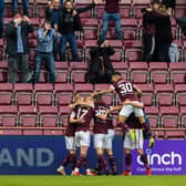 Hearts celebrate during Saturday's win over Celtic.