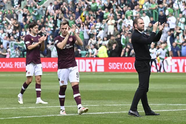 Lawrence Shankland, with Hearts boss Robbie Neilson, applauds the away support after full-time. Picture: SNS