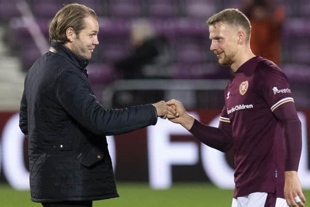 Hearts head coach Robbie Neilson and full-back Stephen Kingsley. The latter says the Tynecastle side have to all be pulling in the same direction as pressure intensifies on his boss. Picture: SNS