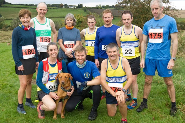 Lauderdale Limpers members with their mascot Diggy and other runners