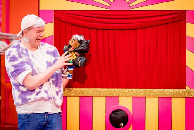 Ellie Diamond out of drag taking part in the puppet challenge