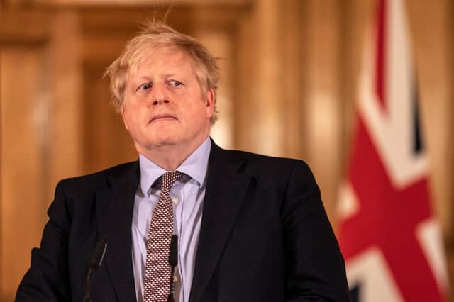 Boris Johnson may discover the Conservatives' 1922 Committee are on the way to see him (Picture: Richard Pohle/pool/AFP via Getty Images)