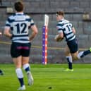 Jack Blain scores the second try for Heriot's during a FOSROC Super6 match against Boroughmuir Bears at Meggetland
