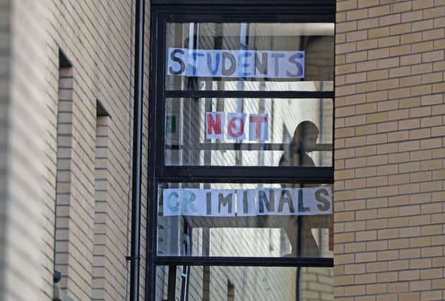 Students protest conditions in halls of residence after going to university in September last year amid lockdown restrictions (Picture: Andrew Milligan/PA)