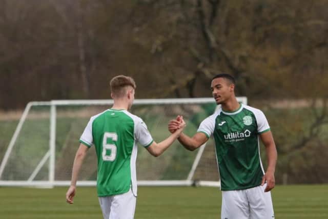 Allan Delferrière celebrates one of his three goals with Murray Aiken during the 3-1 victory over Newcastle United Under-23s