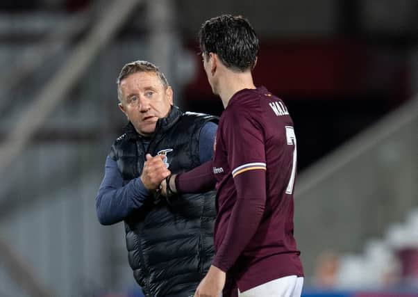 Inverness manager John Robertson with Hearts winger Jamie Walker.
