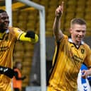 Livingston's Stephen Kelly celebrates scoring to make it 3-0 with comeback man Joel Nouble, who was also on target. Picture: Paul Devlin / SNS
