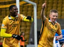 Livingston's Stephen Kelly celebrates scoring to make it 3-0 with comeback man Joel Nouble, who was also on target. Picture: Paul Devlin / SNS