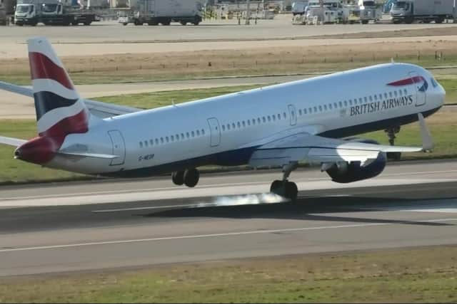 The hair-raising moment a British Airways plane’s tail hit the runway at London Heathrow airport during an aborted landing.