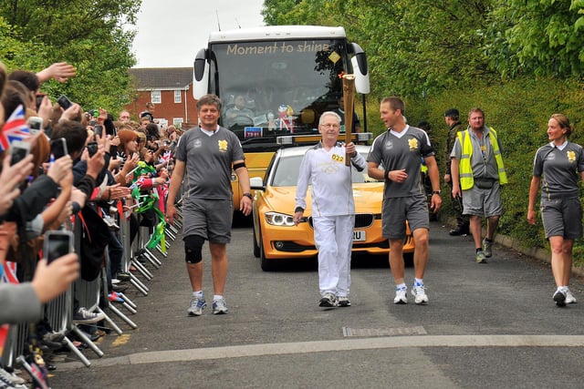 Subtract the year when the Olympic torch relay came to the North East. What's the final answer?