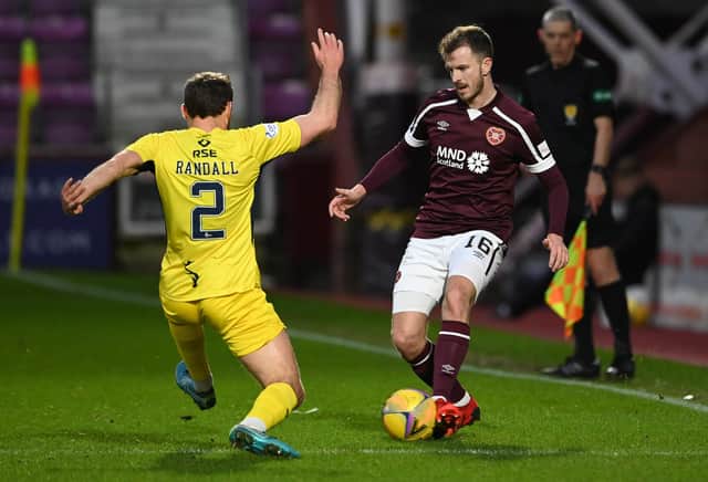 Andy Halliday goes up against Ross County's Connor Randall during the 2-1 win at Tynecastle on Boxing Day. Picture: SNS