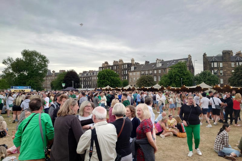 The sun didn't quite shine on Leith for The Proclaimers homecoming gig, but it was a hot and humid evening in the tent. Here, fans queue for welcome drinks to cool down.