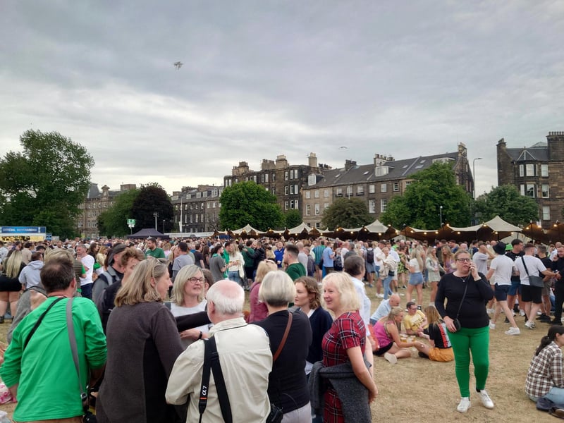 The sun didn't quite shine on Leith for The Proclaimers homecoming gig, but it was a hot and humid evening in the tent. Here, fans queue for welcome drinks to cool down.