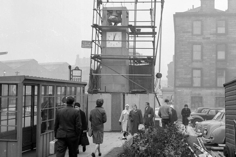The square clock tower that still stands in Festival Square on Lothian Road, was presented to the city by whisky distillers A Bell & Sons. The landmark is pictured being constructed in December 1962