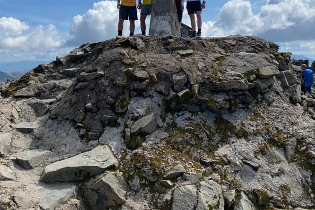 John Scott with climbing companions Craig O’Connor, Michael Tait and Sean Heron at the summit of Ben Nevis