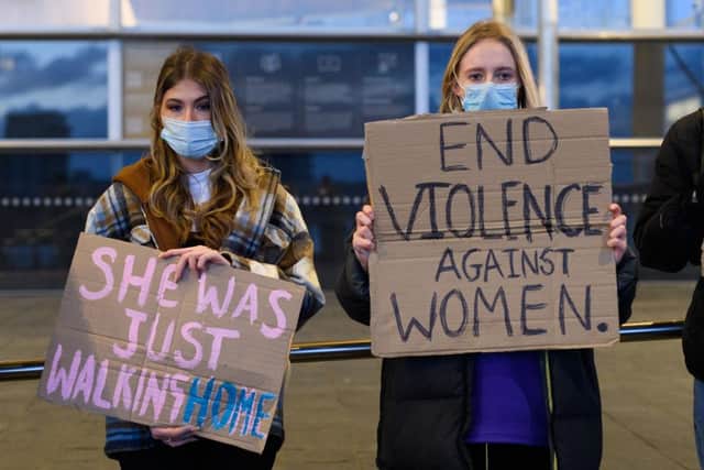 Women hold placards during a vigil held in memory of Sarah Everard in Cardiff, United Kingdom (Photo: Polly Thomas/Getty Images)