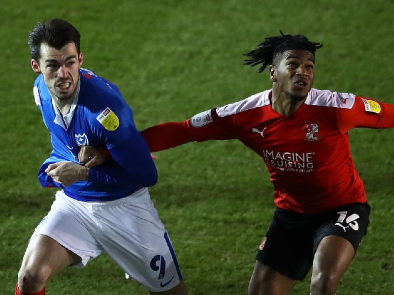 Defender was linked with Pompey and a possible option until Cowley looked elsewhere and he stayed at Swindon