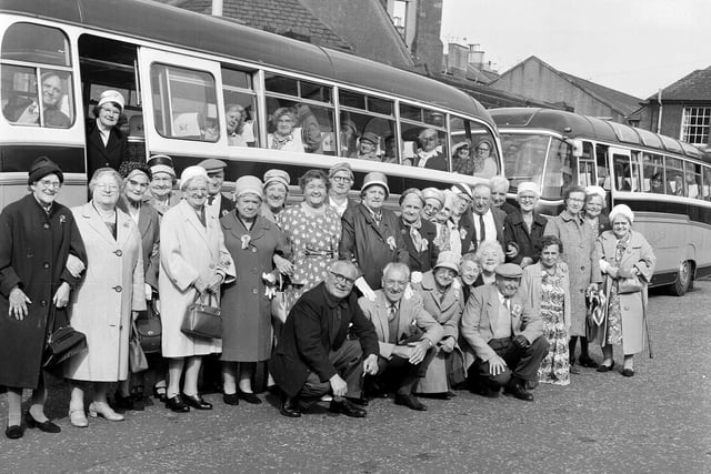 OAPs leave in buses outside Gorgie War Memorial Hall for a day's outing to Largs in 1961.