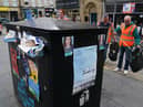 People pick up rubbish in Edinburgh city centre as cleansing workers take strike action (Picture: Andrew Milligan/PA)